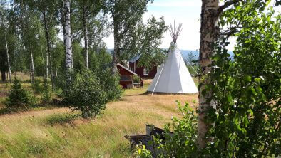 Large tipi tent in natural surroundings